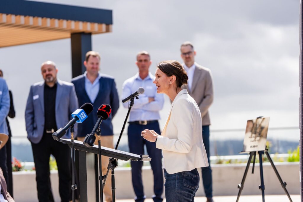 Minister for Housing of New South Wales Rose Jackson officially inaugurating the Macquarie Park apartment complex.